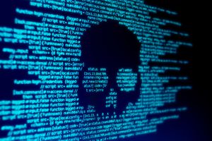 skull shaped out of blue computer code