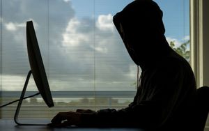 Image representing a hacker creating fake accounts